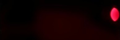 A dark frame with a small pink LED dot near the right edge.